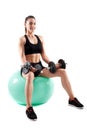 Young athletic woman working out with dumbbells Royalty Free Stock Photo