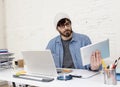 Young hispanic attractive hipster businessman working at modern home office Royalty Free Stock Photo