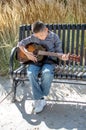 Young Hispanic boy plays his instrument Royalty Free Stock Photo