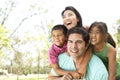 Young Hispanic Family In Park Royalty Free Stock Photo