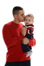 Young Hispanic father kissing his son Royalty Free Stock Photo