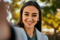 Young hispanic girl smiling happy making selfie by the camera at the city Royalty Free Stock Photo