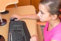 Young hispanic girl working on a computer Royalty Free Stock Photo