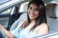 Young hispanic teenage girl learning to drive Royalty Free Stock Photo