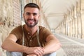 Young Hispanic male smiling outside with copy space Royalty Free Stock Photo