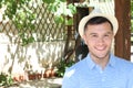 Young Hispanic male smiling outside with copy space Royalty Free Stock Photo