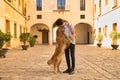 Young Hispanic man with beard and sunglasses hugging his dog standing very happy. Concept animals, dogs, love, pets, golden Royalty Free Stock Photo