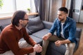 young hispanic man gesturing while talking Royalty Free Stock Photo