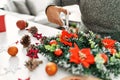 Young hispanic man make handsmade christmas decoration at home Royalty Free Stock Photo