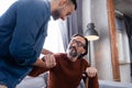 young hispanic man shaking hands with Royalty Free Stock Photo