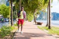 Young Hispanic Man Walking Tropical Beach Sea Holiday Guy Happy Smiling Summer Vacation Royalty Free Stock Photo