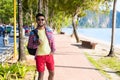 Young Hispanic Man Walking Tropical Beach Sea Holiday Guy Happy Smiling Summer Vacation Royalty Free Stock Photo