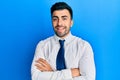 Young hispanic man wearing business clothes happy face smiling with crossed arms looking at the camera Royalty Free Stock Photo