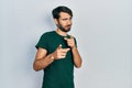 Young hispanic man wearing casual white tshirt pointing fingers to camera with happy and funny face Royalty Free Stock Photo