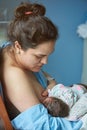 Young hispanic mother woman with newborn Royalty Free Stock Photo