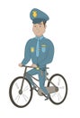 Young hispanic police officer on bicycle.