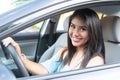 Young hispanic teenage girl learning to drive Royalty Free Stock Photo