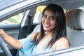 Young hispanic teenage girl learning to drive Royalty Free Stock Photo