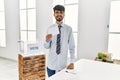 Young hispanic voter man holding vote at electoral college