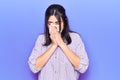 Young hispanic woman illness using paper handkerchief on nose