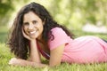 Young Hispanic Woman Relaxing In Park