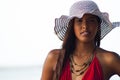 Young Hispanic Woman in Sun Hat at Beach Royalty Free Stock Photo