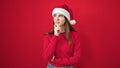 Young hispanic woman wearing christmas thinking over isolated red background Royalty Free Stock Photo