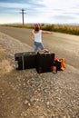 Young hitch-hiker girl Royalty Free Stock Photo