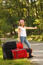 Young hitch-hiker girl Royalty Free Stock Photo