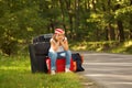 Young hitch-hiker girl Royalty Free Stock Photo