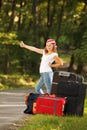 Young hitch-hiker girl Royalty Free Stock Photo