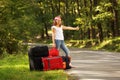 Young hitch-hiker girl Royalty Free Stock Photo