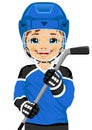 A young hockey player in uniform with an ice hockey stick Royalty Free Stock Photo