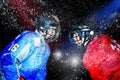 Young hockey players face-to-face at ice arena Royalty Free Stock Photo