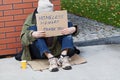 Young homeless male begging for help Royalty Free Stock Photo