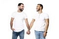 Young homosexuals gay couple love each other on a white background.