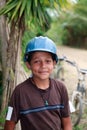 Young Honduran Boy Wearing a Construction Hard Hat