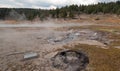 Young Hopeful Geyser next to Firehole Lake in the Lower Geyser Basin in Yellowstone National Park in Wyoming USA Royalty Free Stock Photo