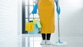 Young housekeeper or washing cleaning floor at mop in protective gloves, Housework Cleaning service