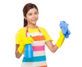 Young housewife clean with bottle spray and rag