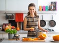 Young housewife cooking pumpkin Royalty Free Stock Photo