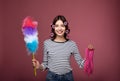 Young housewife in curlers is cleaned