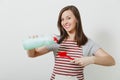 Portrait of young attractive smiling brunette caucasian housewife on white background. Beautiful housekeeper woman Royalty Free Stock Photo