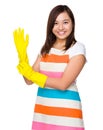 Young housewife wear with plastic glove Royalty Free Stock Photo