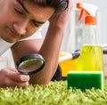 Young husband man cleaning floor at home Royalty Free Stock Photo