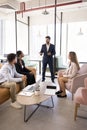 Young Indian business team leader man conducting meeting with employees Royalty Free Stock Photo