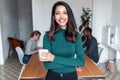 Young indian business woman entrepreneur looking at camera in the office Royalty Free Stock Photo