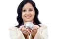 Young Indian business woman holding puzzle globe Royalty Free Stock Photo