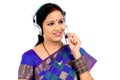 Young Indian business woman wearing headset Royalty Free Stock Photo