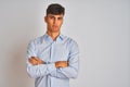 Young indian businessman wearing elegant shirt standing over isolated white background skeptic and nervous, disapproving Royalty Free Stock Photo